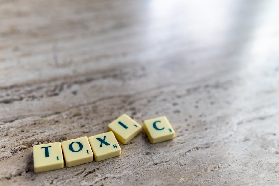 Students engage eagerly in a classroom raising hands and participating in a lesson with their teacher.
